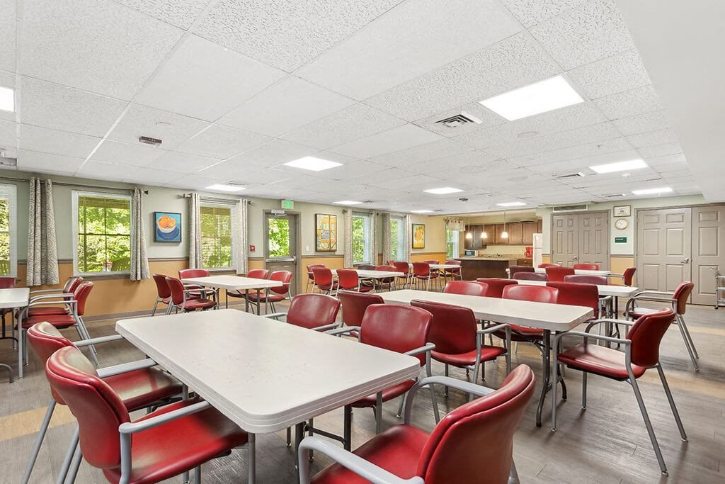 Community lounge and kitchen at Fairbrooke Senior Apartments in Aberdeen MD